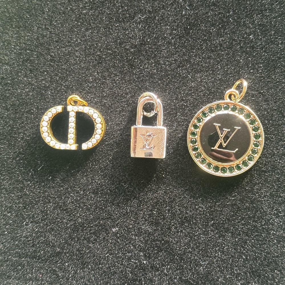 Upcycled Charm Lot of Three will come with one gold toned chain